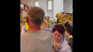 Borussia Dortmund fans gathered at a local church to sing You'll Never Walk Alone (via BVB) #shorts