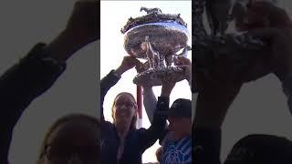 Jena Antonucci lifts trophy at the 155th running of the Belmont Stakes