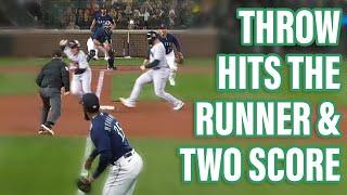 Outfielders throw hits the baserunner and 2 runs score, a breakdown