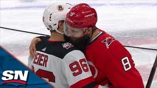Carolina Hurricanes And New Jersey Devils Exchange Handshakes Following Their Five-Game Series