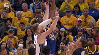 Domantas Sabonis gets elbowed in face on jump ball with Kevon Looney | NBA on ESPN