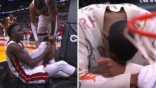 Victor Oladipo helped off court with apparent knee injury, Heat crowd goes silent | NBA on ESPN