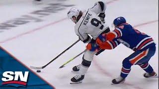 Kings' Adrian Kempe Drives To The Net And Tucks Puck Under Crossbar To Beat Oilers' Stuart Skinner