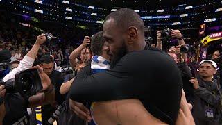 LeBron James & Steph Curry embrace after the Warriors' Game 6 elimination