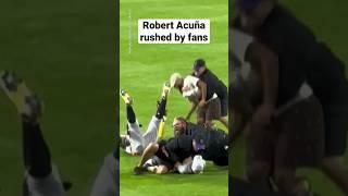 Robert Acuña rushed by fans in the middle of the game #shorts